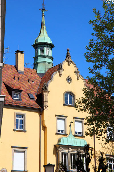 Germanic building with spire, rounded gabel & oriel window. Lindau im Bodensee, Germany.