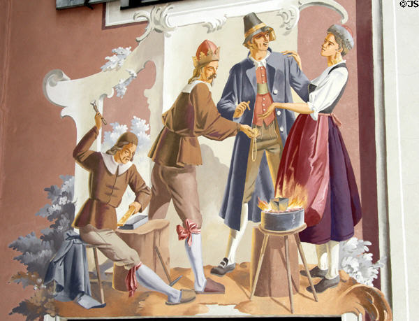 Fresco with Bavarian scene with traditionally dressed figures. Oberammergau, Germany.