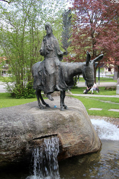 Passion Play sculpture of Christ with palm branch on donkey at Oberammergau theater. Oberammergau, Germany.