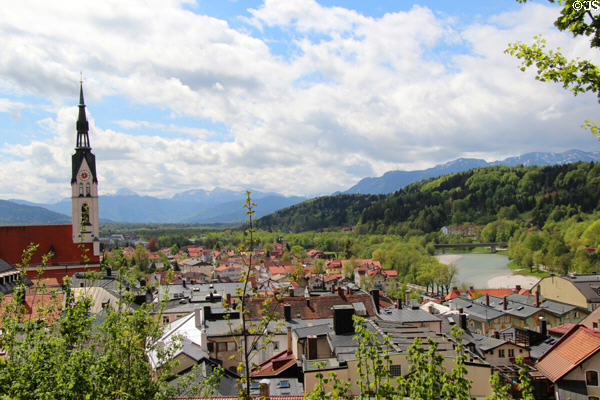 Assumption of Mary church near Isar River with Alps in distance. Bad Tölz, Germany.