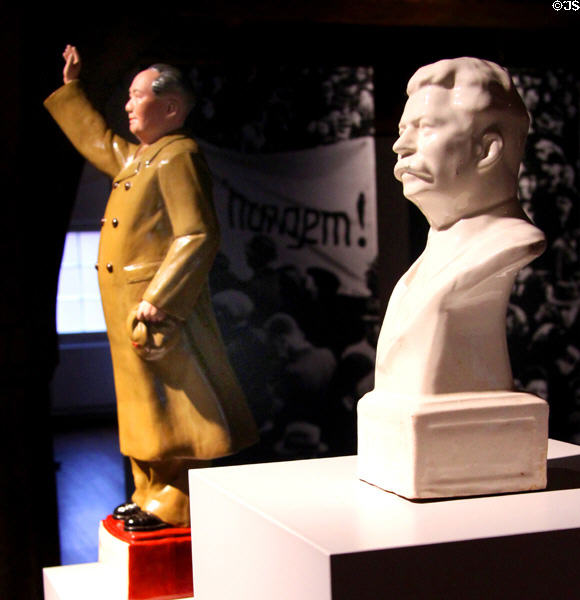 Josef Stalin bust massed produced in the USSR & statuette of Mao Tse-tung, both absolute dictators notorious for their adept use of propaganda & for their reigns of terror leading to countless deaths at Museum of Bread and Art. Ulm, Germany.