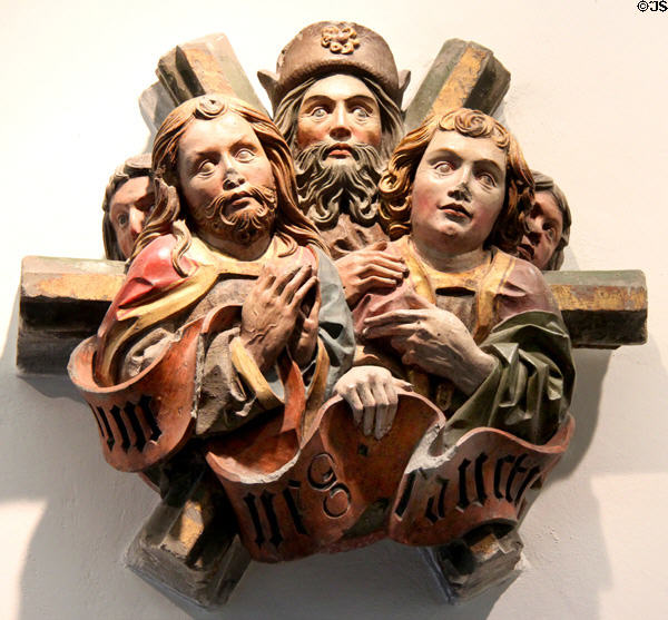 Ceiling sandstone keystone with sculpture of saints (1490) with original painting by unknown artist from destroyed St Benedict Chapel at Kloster Blaubeuren at Ulmer Museum. Ulm, Germany.