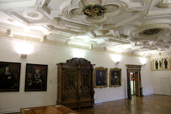 Gallery with coffered ceiling (16thC) showing painting & antique furniture at Ulmer Museum. Ulm, Germany.