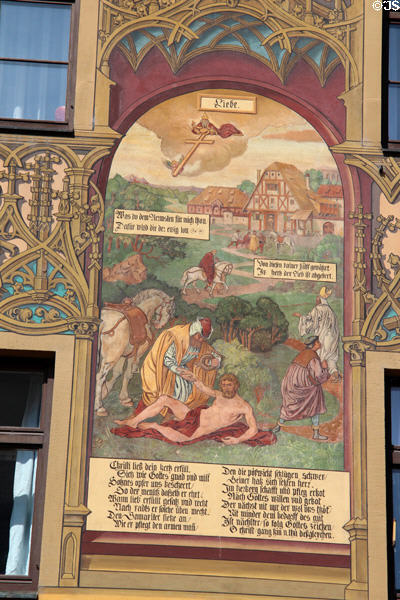 Love of & care for fellow man scene on Ulm Rathaus. Ulm, Germany.