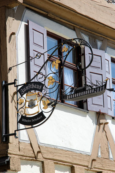 Sign for Zunfthaus with miniature canal boat on half-timbered building near Blau river. Ulm, Germany.