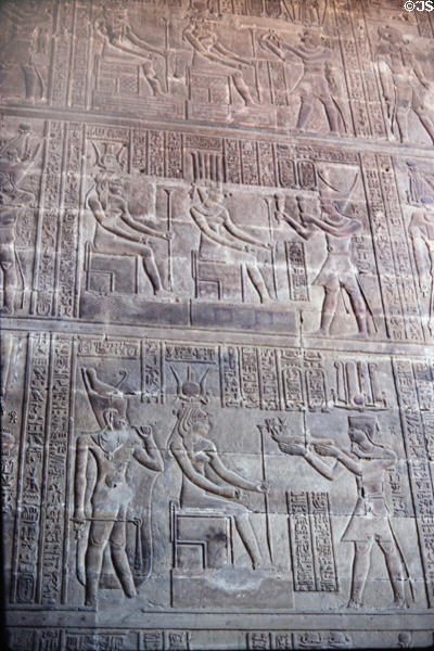 Carved scenes on walls inside Temple of Khnum in Esna. Egypt.