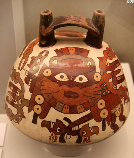 Nazca culture ceramic bridge-handle global vessel with figure painting (100-700) from Peru at Museum of America. Madrid, Spain.