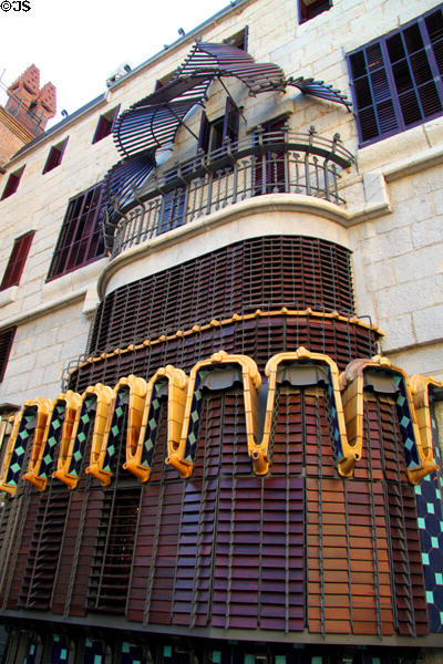 Gaudi's screen on rear patio which adjusts to shade interior of rear hall from direct sun at Palau Güell. Barcelona, Spain.