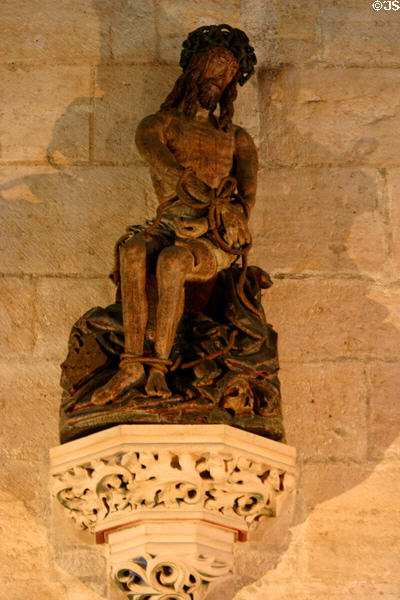Christ in bondage sculpture (end 15thC) in great hall of the poor in Hotel Dieu. Beaune, France.