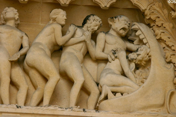 Souls entering jaws of hell at Last Judgment on tympanum of Cathedral. Metz, France.