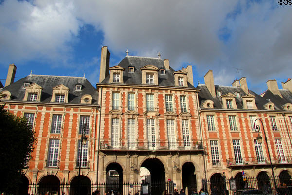 North end exit arches of Place des Vosges. Paris, France.