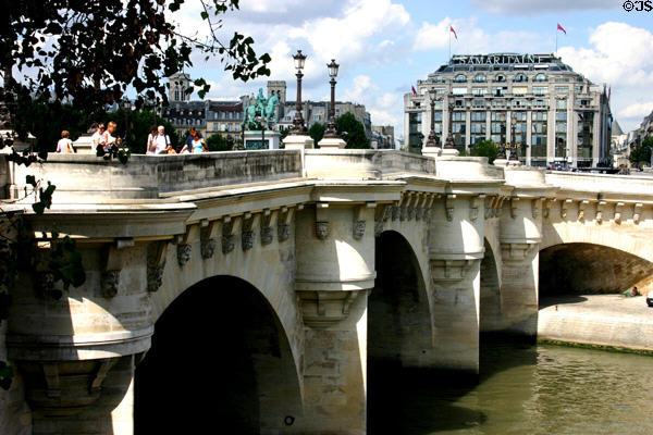 Pont Neuf with Samaritaine department store at far end. Paris, France.