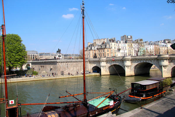 Western tip of Île de la Cité with equestrian statue of Henri IV & Pont Neuf. Paris, France.