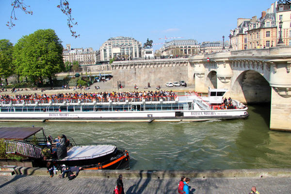 Western tip of Île de la Cité with equestrian statue of Henri IV & Pont Neuf. Paris, France.