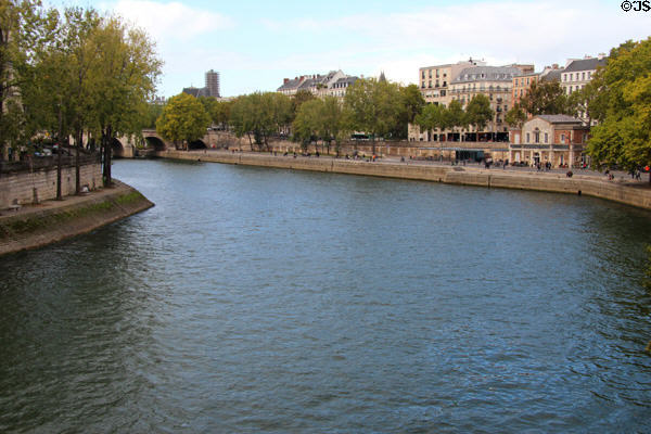 Seine riverfront buildings along Quai des Célestins opposite Île St Louis. Paris, France.