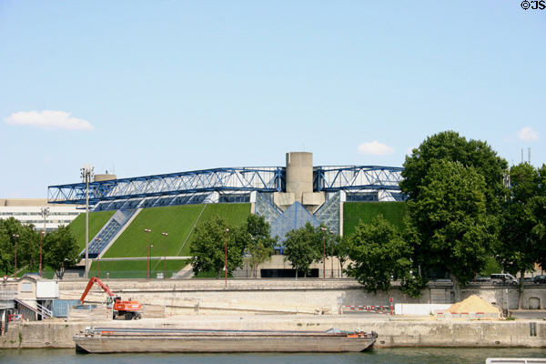 Palais Omnisports de Paris-Bercy (1984) (8 Boulevard de Bercy) beside Seine. Paris, France. Architect: Pierre Parat, Michel Andrault, Aydin Guvan & Jean Prouvé.