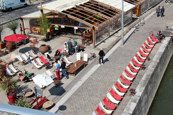 Restaurant on banks of River Seine near National Library. Paris, France.