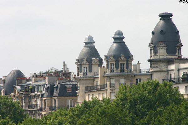 Turreted residences along Seine near Pont de Bir-Hakeim. Paris, France.