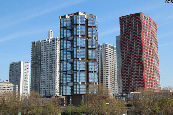 Tour Totem (1979) & red Hôtel Novotel (1976) surrounded by Grenelle area tower residences. Paris, France.