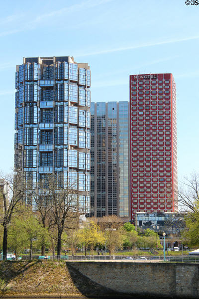 Tour Totem (1979) by Pierre Parat & Michel Andrault & red Hôtel Novotel Paris Tour Eiffel (1976) by Julien Penven & Jean Claude Le Bail both in Grenelle area. Paris, France.