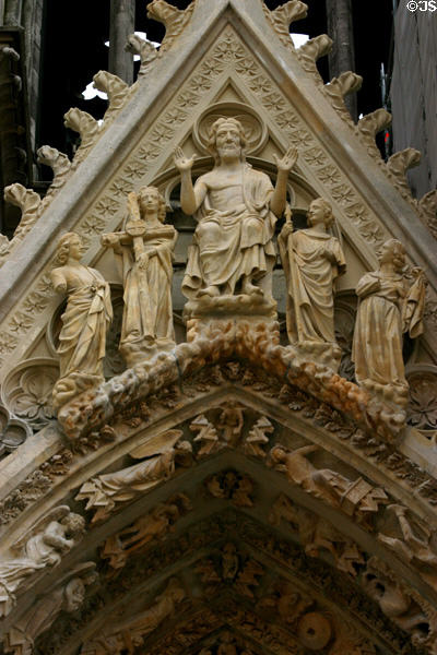 Christ with female saints over portal of Cathedral. Reims, France.