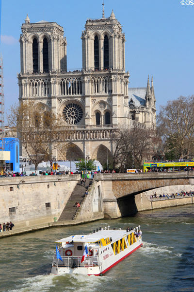 Notre Dame Cathedral over Cité Bridge. Paris, France.