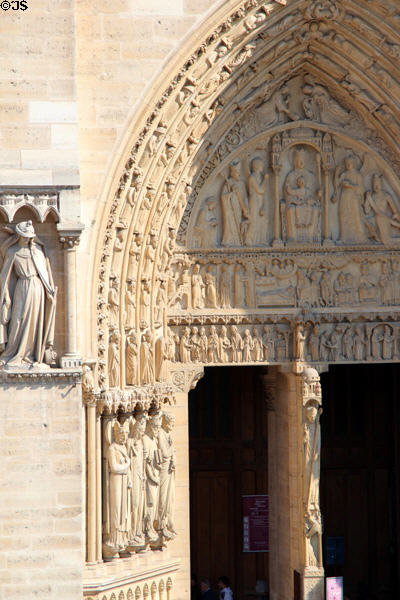 Right Gothic portal of Notre Dame Cathedral. Paris, France.