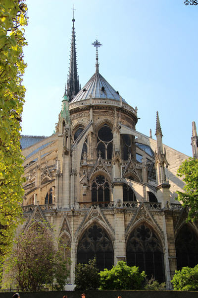 Gothic rear structure of Notre Dame Cathedral with flying buttresses. Paris, France.