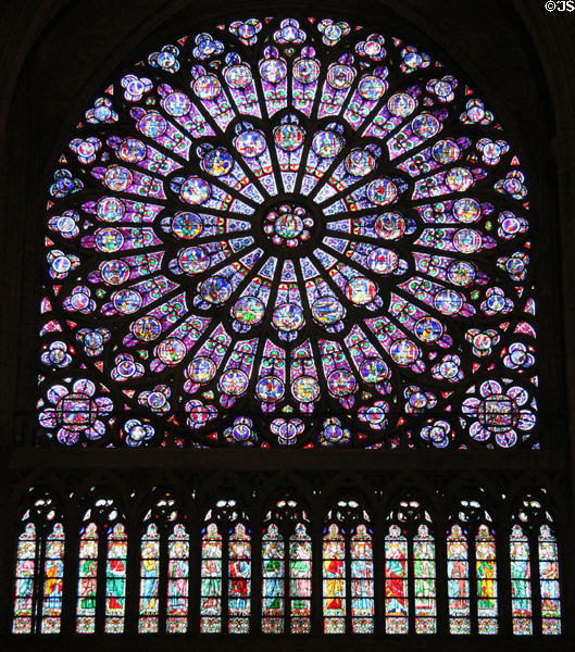 Rose window of Virgin & Child circle by old testament figures in north transept of Notre Dame Cathedral. Paris, France.