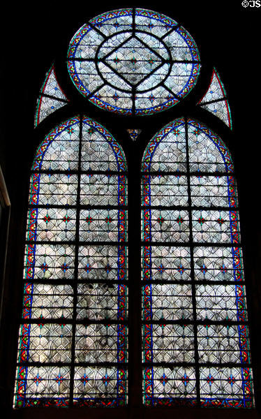 Example of early evolution of Medieval stained glass window in Notre Dame Cathedral. Paris, France.