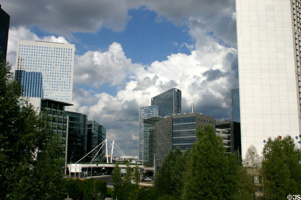 Towers of La Défense flanking ring road around modern development. Paris, France.