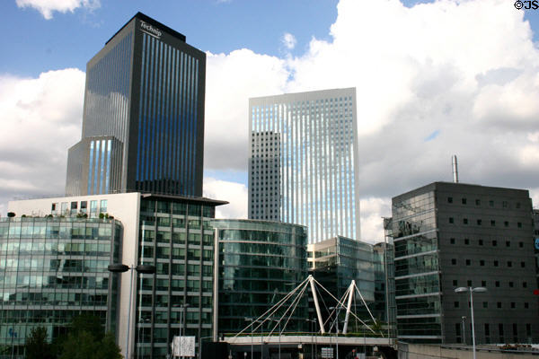 Black Adria (2002) & white Egée (1999) towers over low-rise residences at La Défense. Paris, France.
