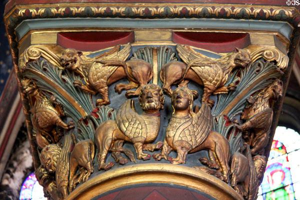 Restored gilded sphinxes on column capital at St-Germain-des-Prés. Paris, France.