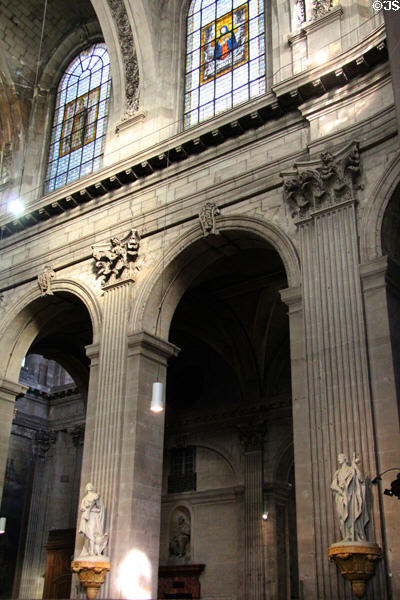 Arches between nave & aisles at St-Sulpice church. Paris, France.