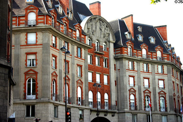 Highly ornamented red-trimmed building (early 20thC) on Left Bank. Paris, France.