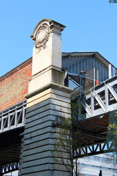 Decorated pillar of Quai de la Gare elevated metro station. Paris, France.