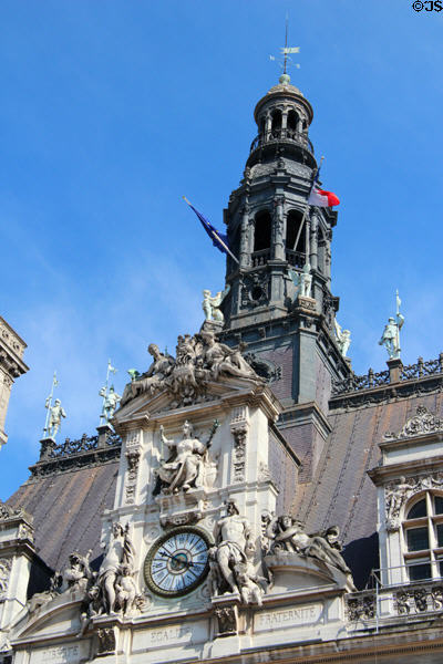 Paris City Hall clock (1882) surrounded by mythological figures. Paris, France.