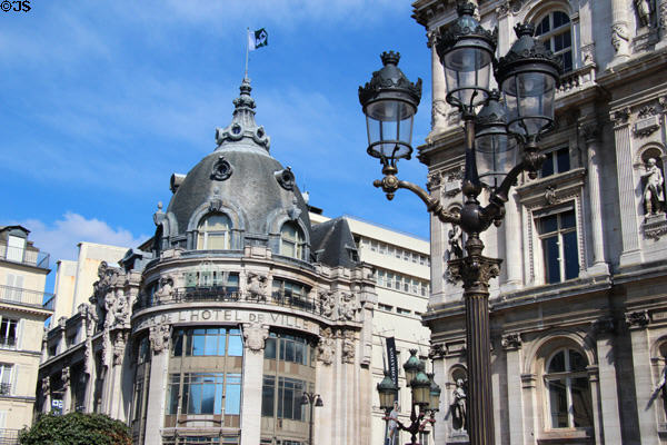 Domed corners of Bazar de l'Hotel de Ville department store (1913) across street from Paris City Hall. Paris, France. Architect: Auguste Roy.