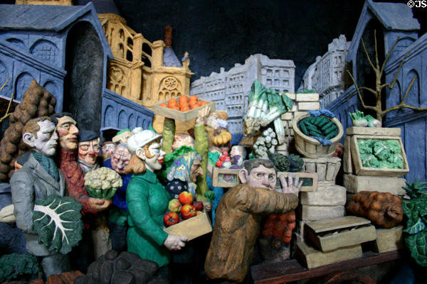 Departure of fruits & vegetables from Les Halles market in heart of Paris sculpture (1969) by Raymond Mason at St Eustache Les Halles. Paris, France.