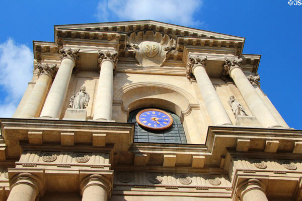 St Roch Church facade with clock. Paris, France.