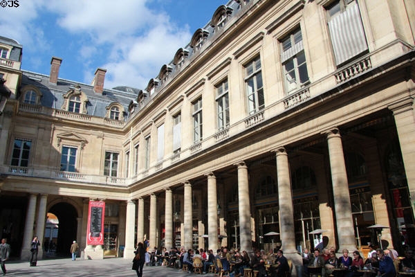Boutique shops & cafe at Palais Royale. Paris, France.