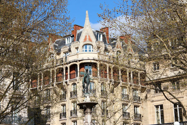 Fountain on square near Palais Royale. Paris, France.