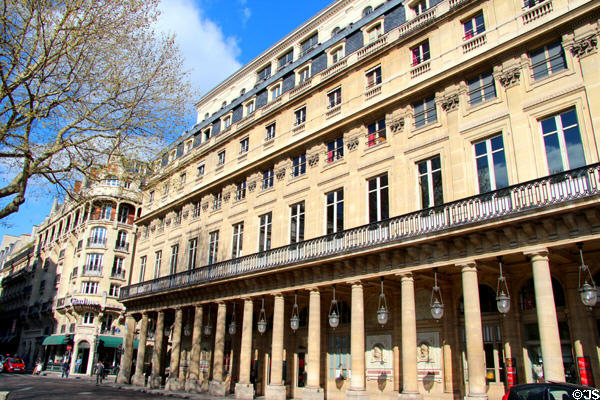 Long facade & arcade of Comedie Français theater. Paris, France.