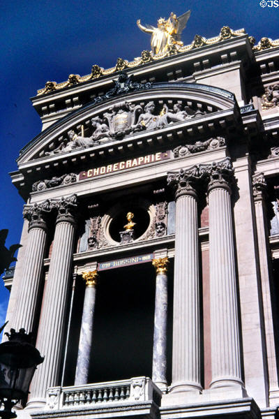 Arch featuring choreography over bust of Rossini on facade of Opéra Garnier. Paris, France.
