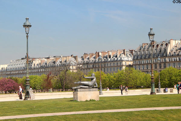 L'Air statue (1932) by Aristide Maillol in Tuileries Garden with rue de Rivoli buildings beyond. Paris, France.