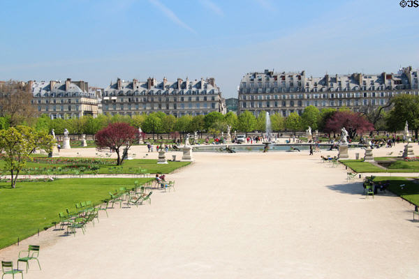 Grand basin (1600s) in Tuileries Garden with rue de Rivoli buildings beyond. Paris, France. Architect: Andre Le Notre.