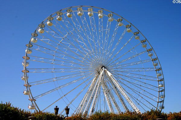 Zigzag structure of another kind of occasional giant Ferris Wheel at Tuileries Garden. Paris, France.