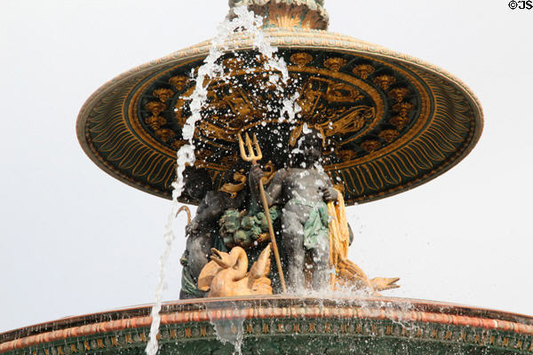 Fountain of Rivers upper section detail with figure holding trident (1840) by Jacques Ignace Hittorff in northern position on Place de la Concorde. Paris, France.