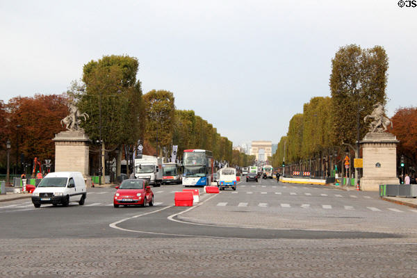 Champs Élysées leaving Place de la Concorde flanked by two Marly horses by sculptor Guillaume Coustou. Paris, France.