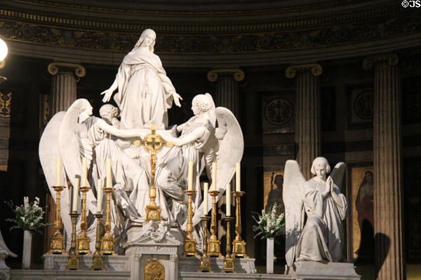 Altar with the statue of Mary Magdalene at Église de la Madeleine. Paris, France.